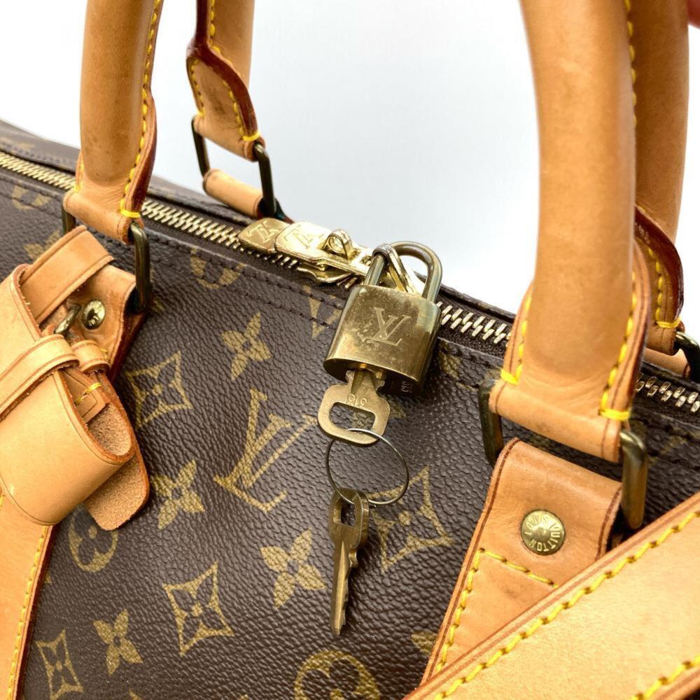 LOUIS VUITTON Brown Monogram Leather Keepall 55 Boston Bag - Picture 3 of 9